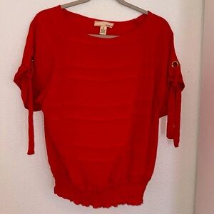 Sheer red blouse size medium with reaching at the bottom and ties on on side